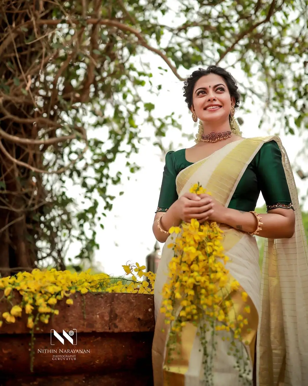 Anusree Nair In Beautiful Earrings Jewellery White Saree Green Blouse